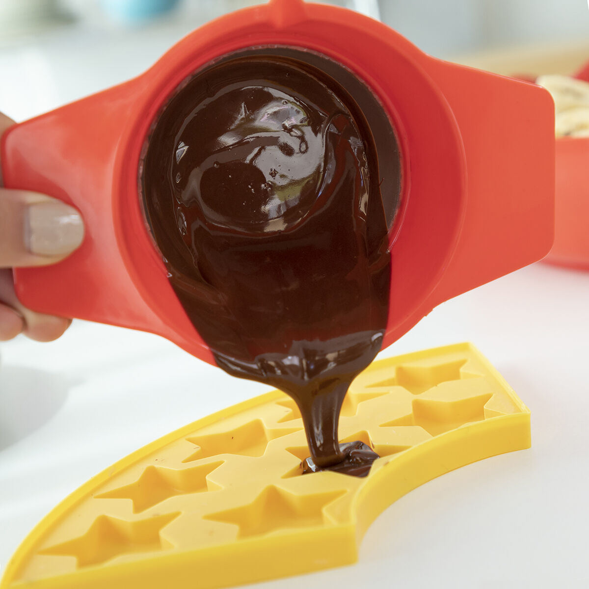 Gummibärchen und Schokoladenfonduemaschine